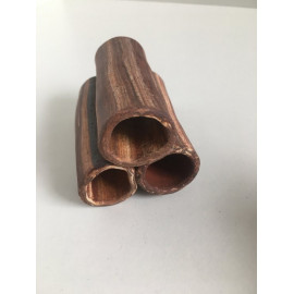 Bloque tubos ceramica abiertos en extremos oscuro